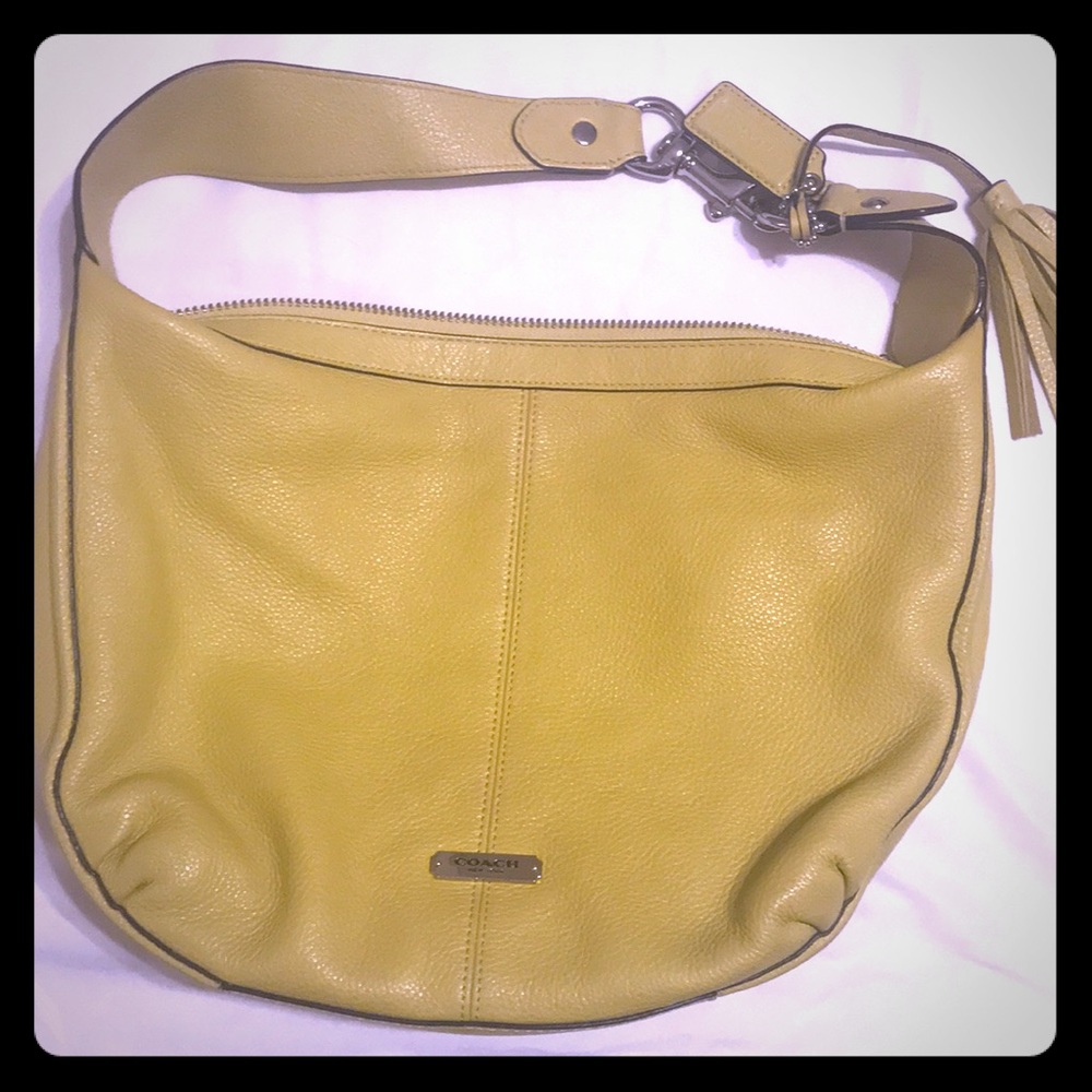 Yellow leather coach handbag.